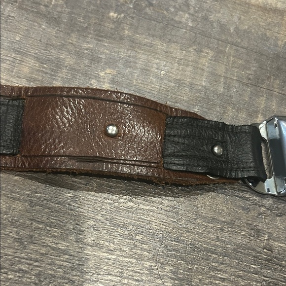 Brown and Black leather Belt seatbelt style